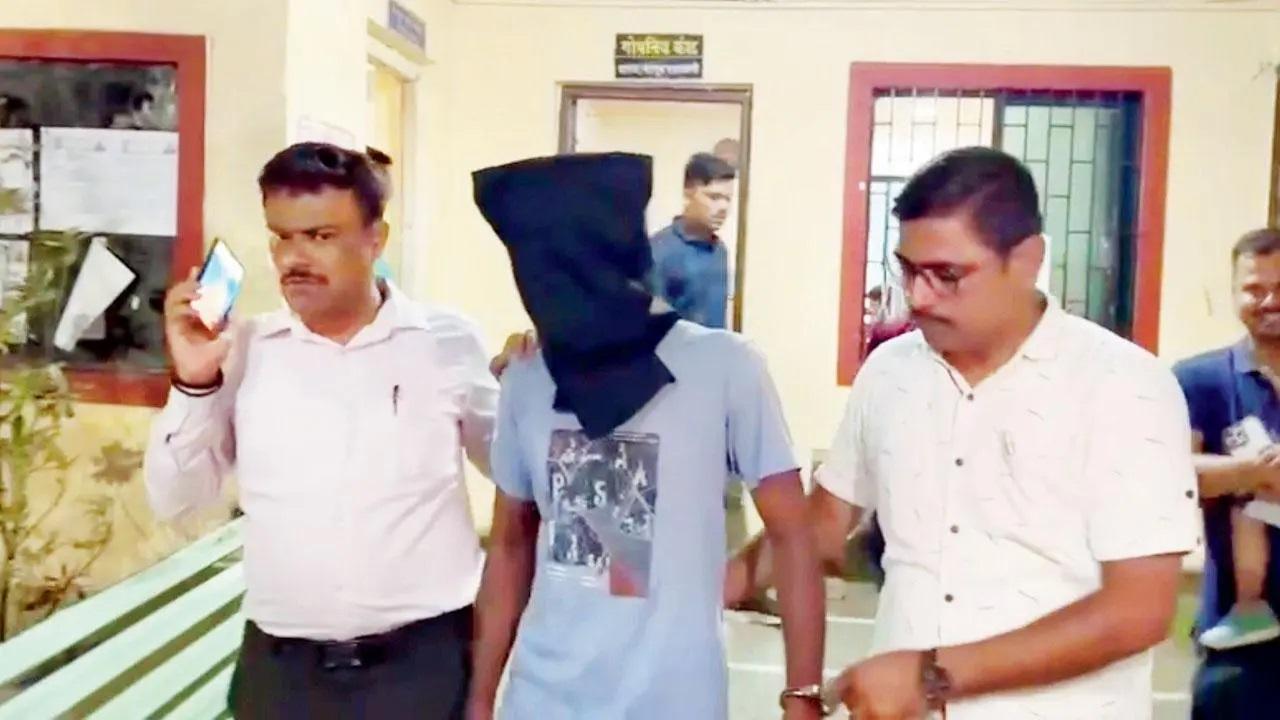 पुलिस हिरासत में आरोपी. तस्वीरें/हनीफ पटेल