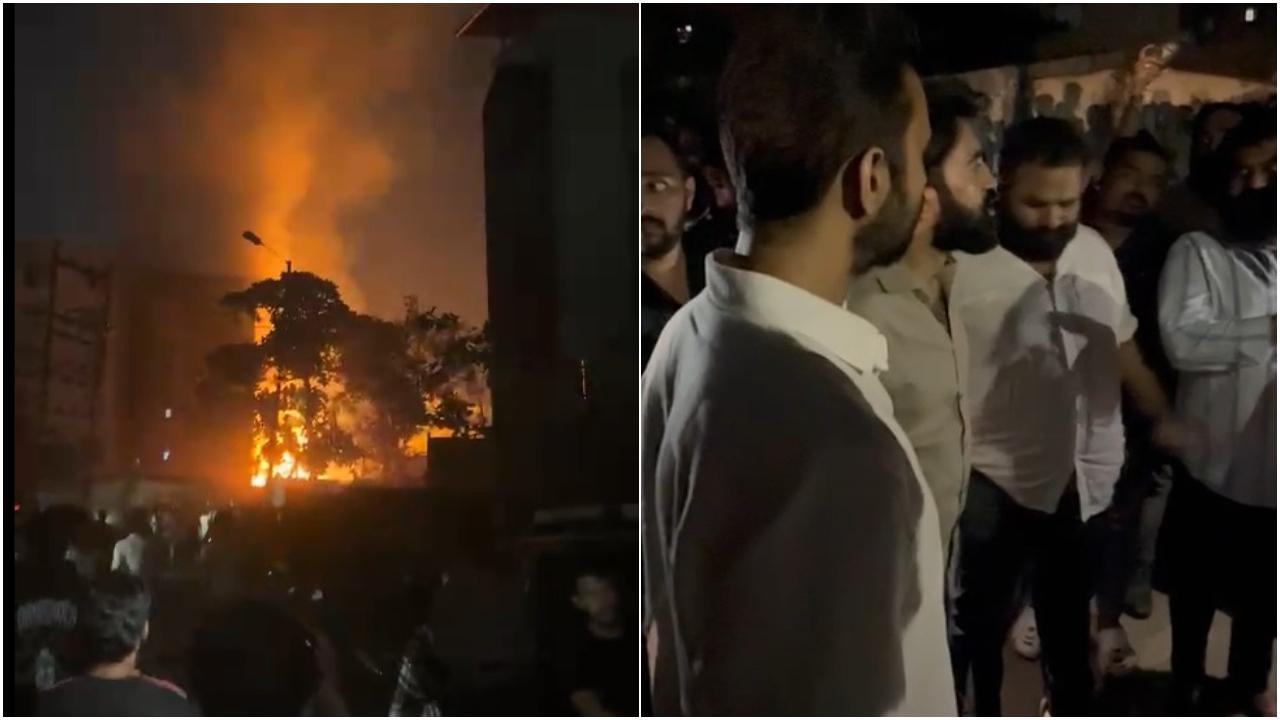 आग की लपटें बढ़ती देख लोगों में दहशत फैल गई.